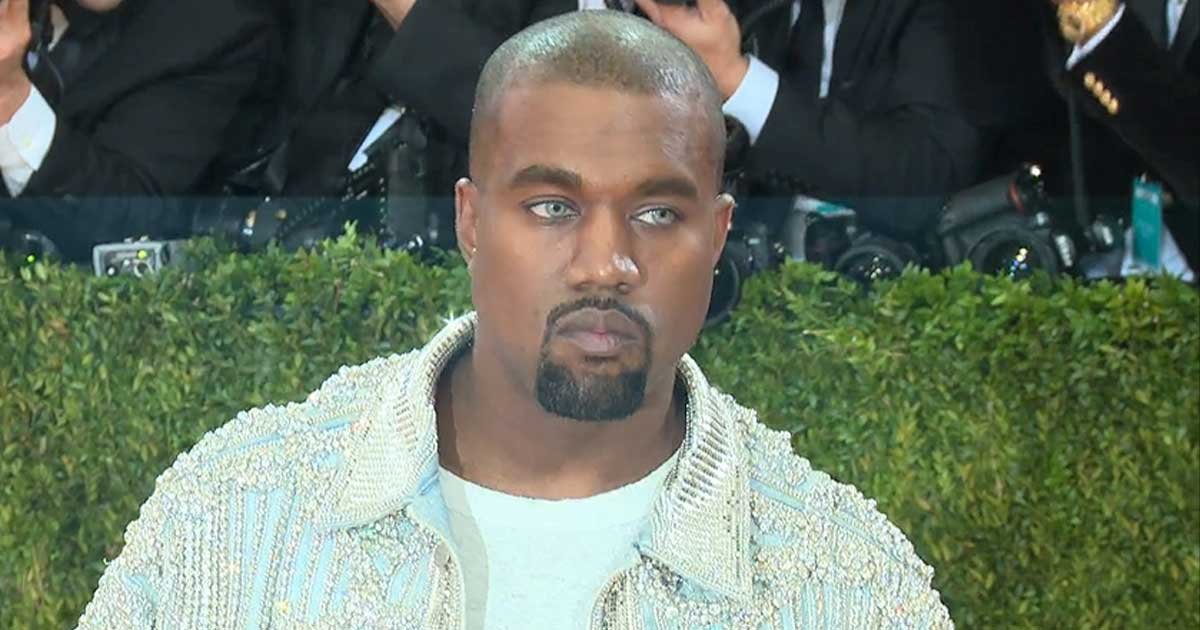 kanye west spotted in japan with three of his kids after wildfire evacuation getting slammed for being a horrible father.jpg